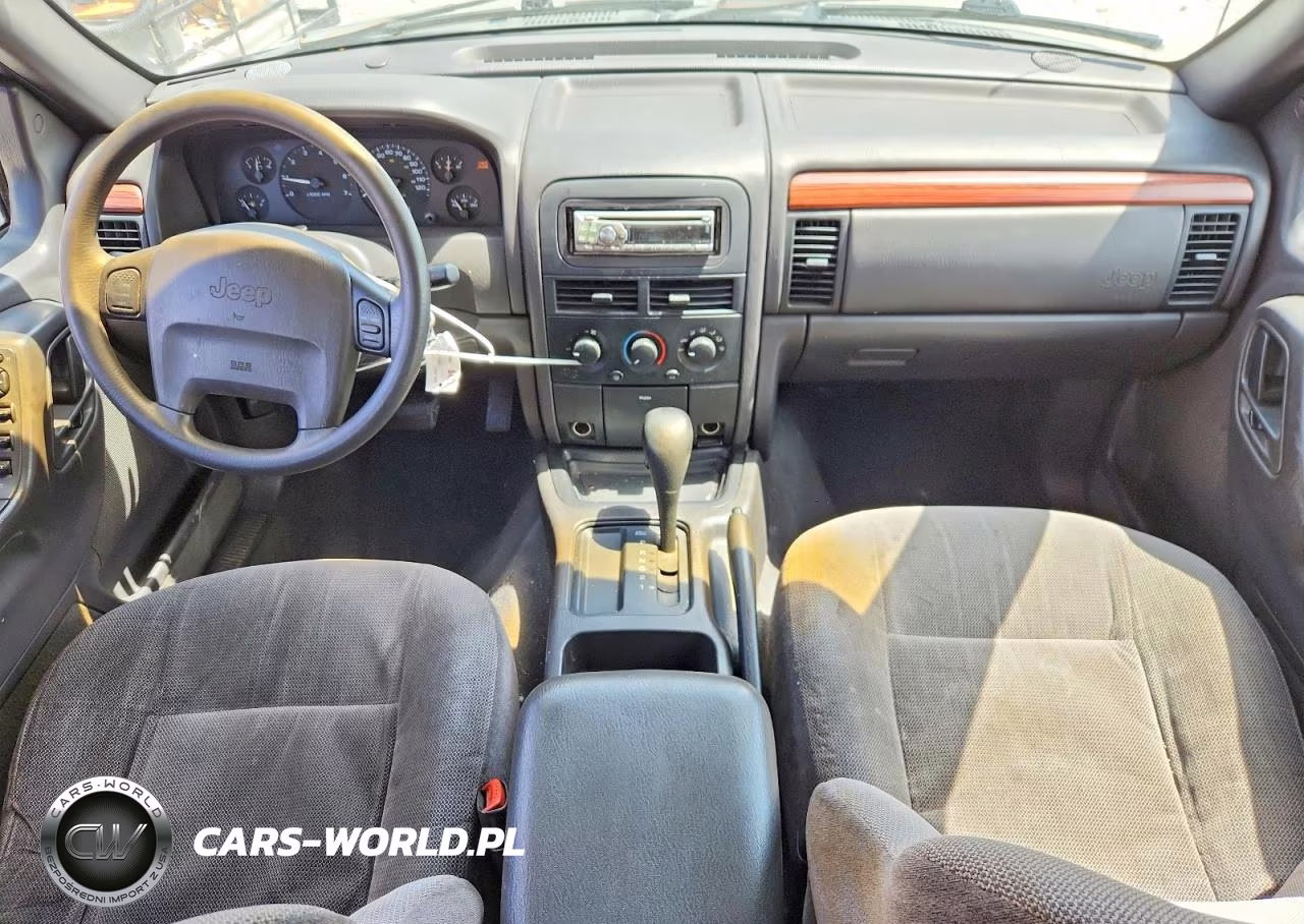 1999 Jeep Grand Cherokee Laredo VIN:1J4G258S2XC660474 - 8