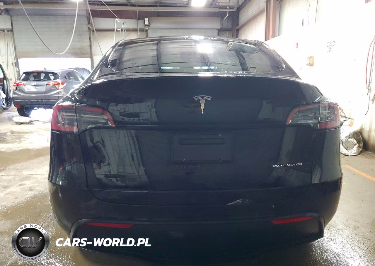 2023 Tesla Model Y VIN:7SAYGDEE9PA166751 - 6