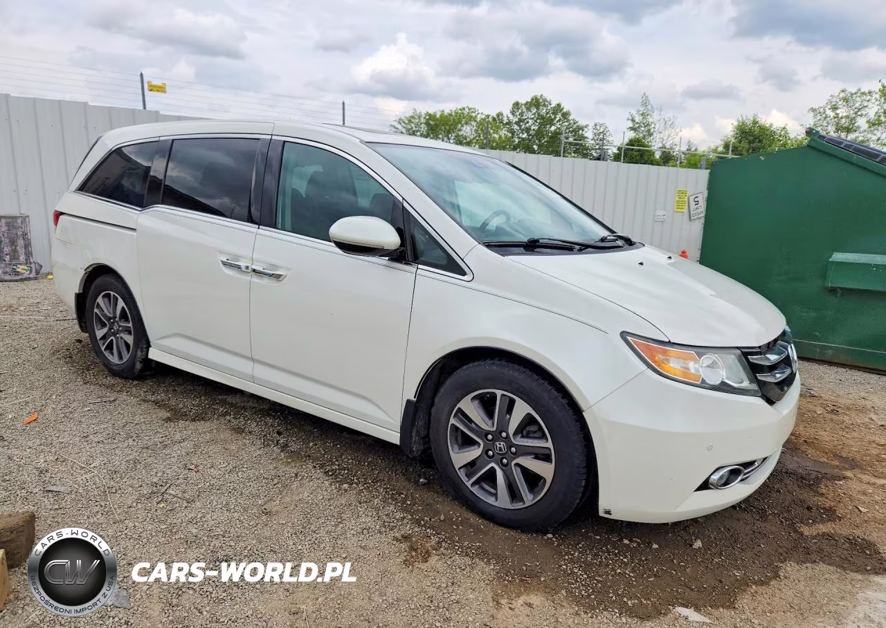 2014 Honda Odyssey Touring VIN:5FNRL5H9XEB065803 - 4