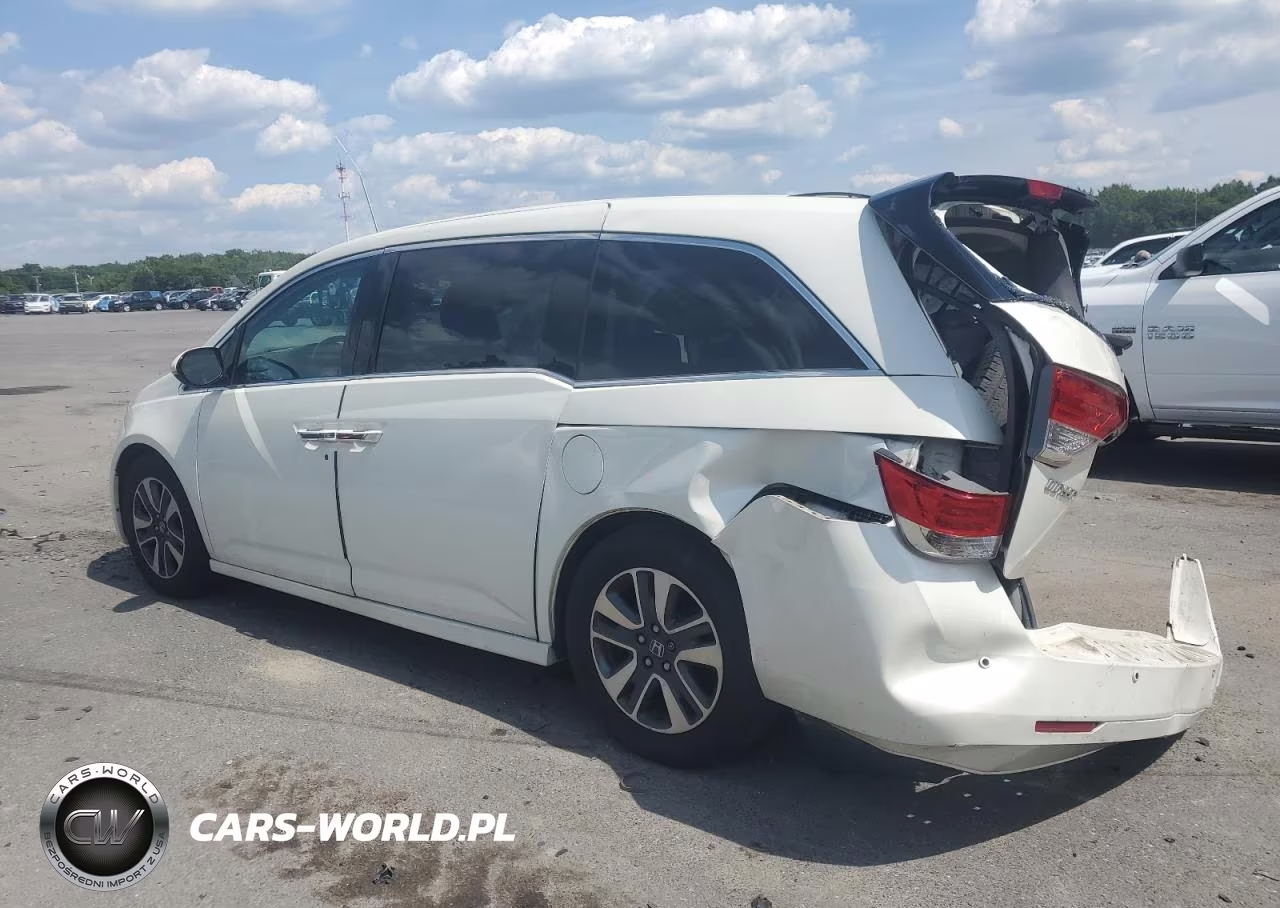 2015 Honda Odyssey Touring VIN:5FNRL5H95FB045945 - 2