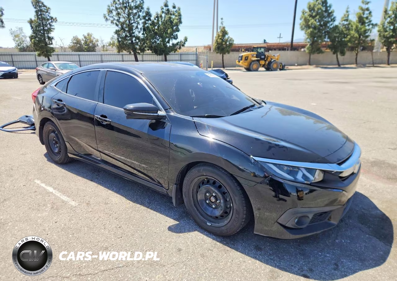 2016 Honda Civic Touring VIN:2HGFC1F99GH640082 - 4