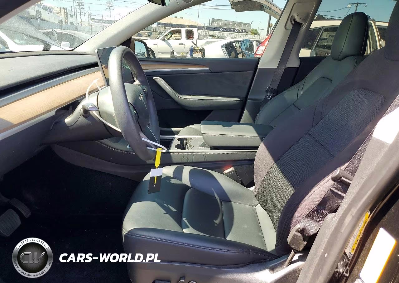 2023 Tesla Model Y VIN:7SAYGDEE2PA109906 - 7