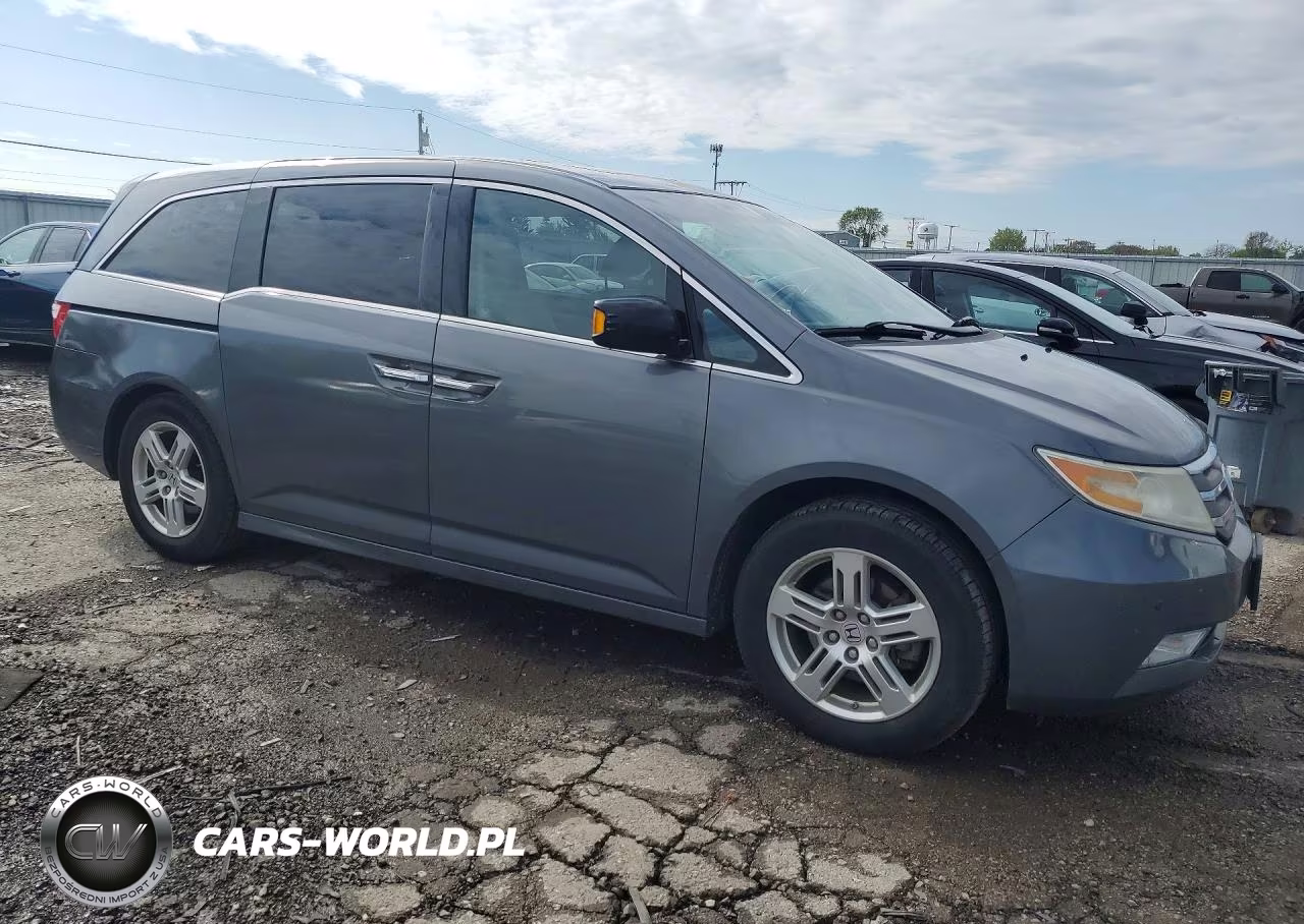 2012 Honda Odyssey Touring VIN:5FNRL5H92CB041637 - 4