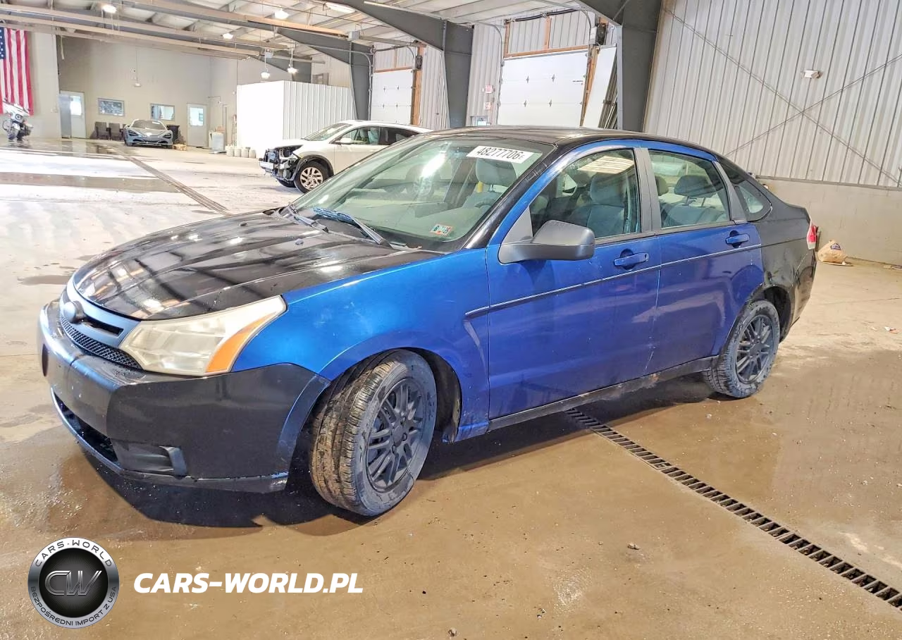 2009 Ford Focus Se VIN:1FAHP35N89W235895 - 1
