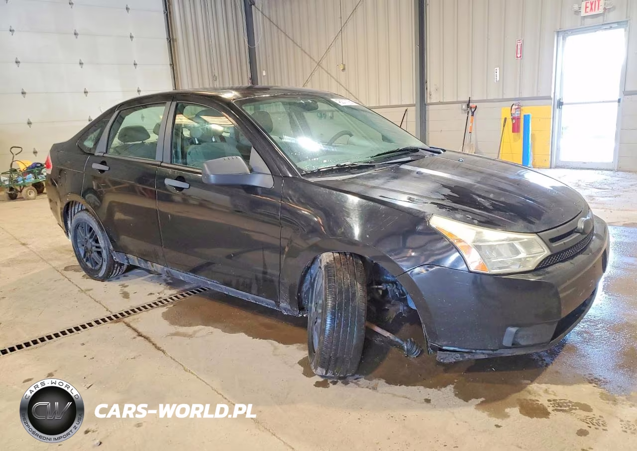 2009 Ford Focus Se VIN:1FAHP35N89W235895 - 4