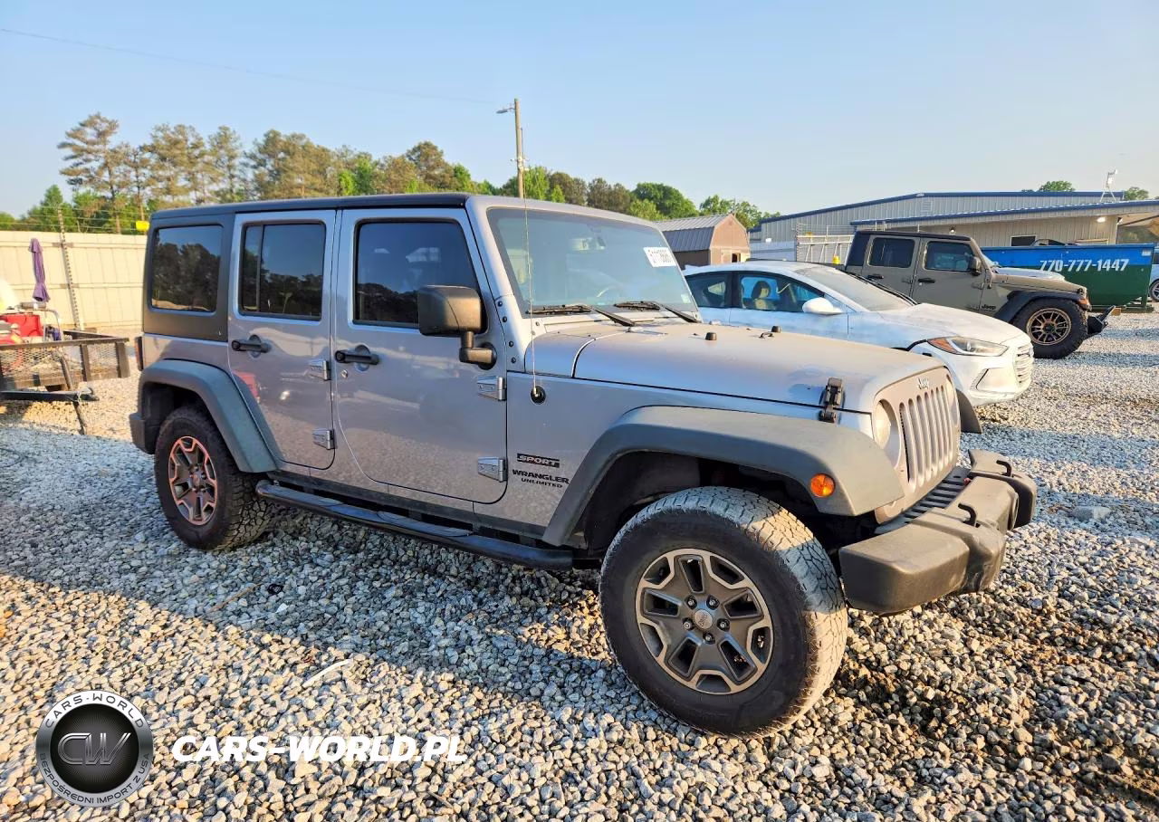 2015 Jeep Wrangler Unlimited Sport VIN:1C4HJWDG4FL528657 - 4