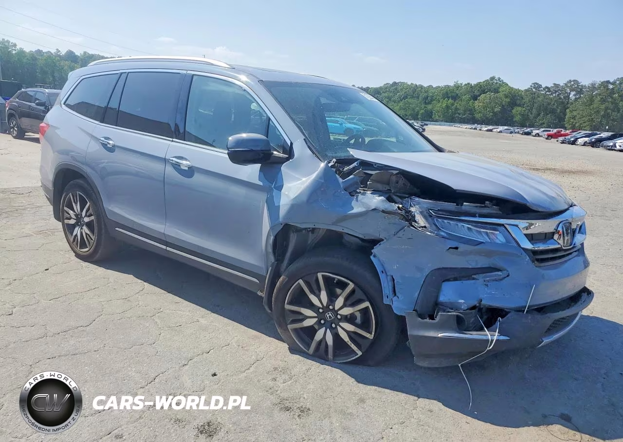 2022 Honda Pilot Touring VIN:5FNYF5H60NB030504 - 4