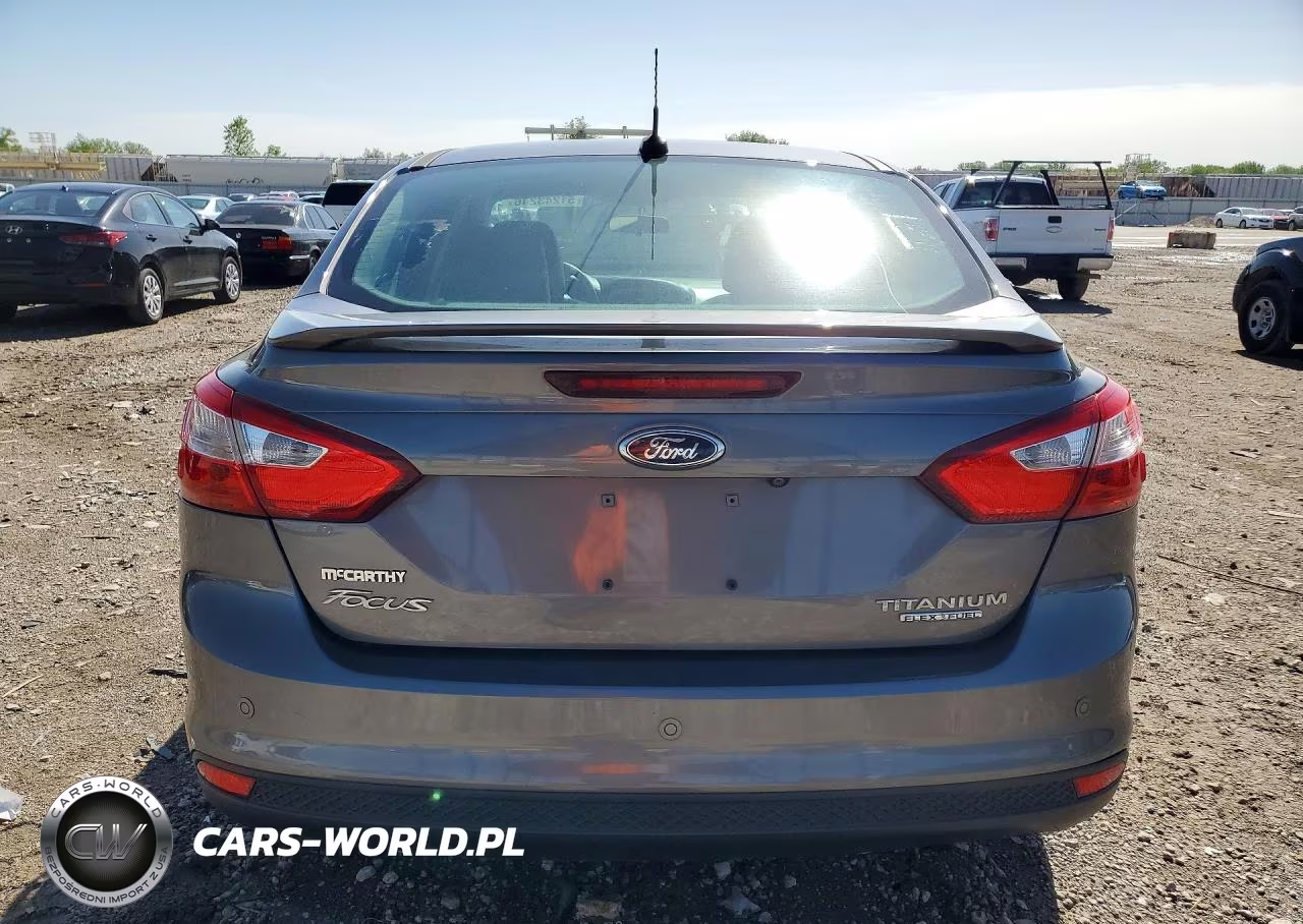 2014 Ford Focus Titanium VIN:1FADP3J29EL413240 - 6