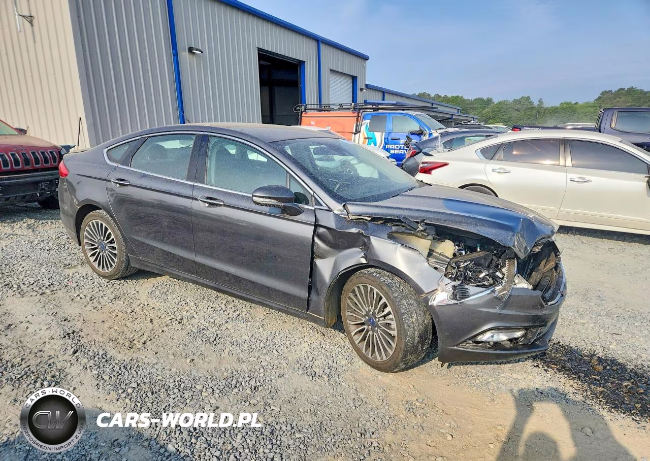 2017 Ford Fusion Titanium VIN:3FA6P0K99HR266572 - 4