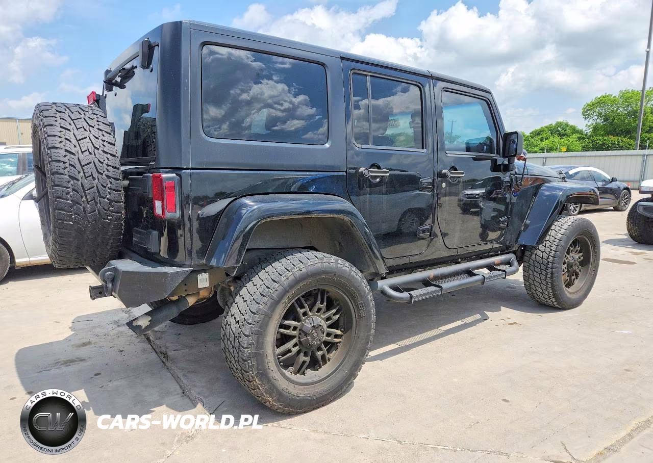 2014 Jeep Wrangler Unlimited Sahara VIN:1C4BJWEG9EL100473 - 3
