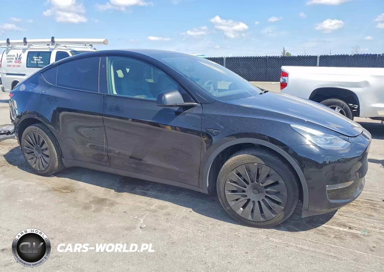 2023 Tesla Model Y VIN:7SAYGDEE3PA140632 - 4