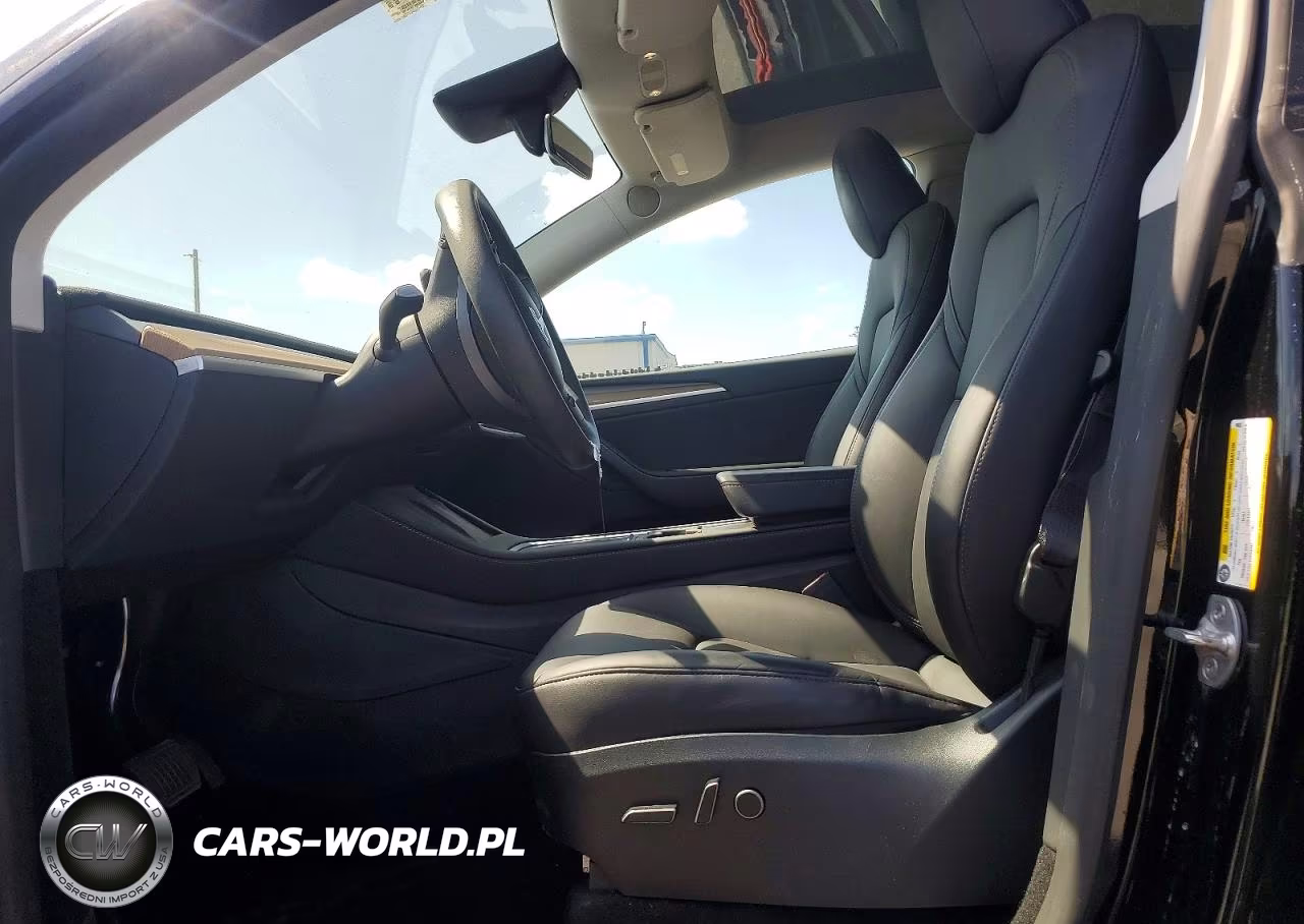 2023 Tesla Model Y VIN:7SAYGDEE3PA140632 - 7