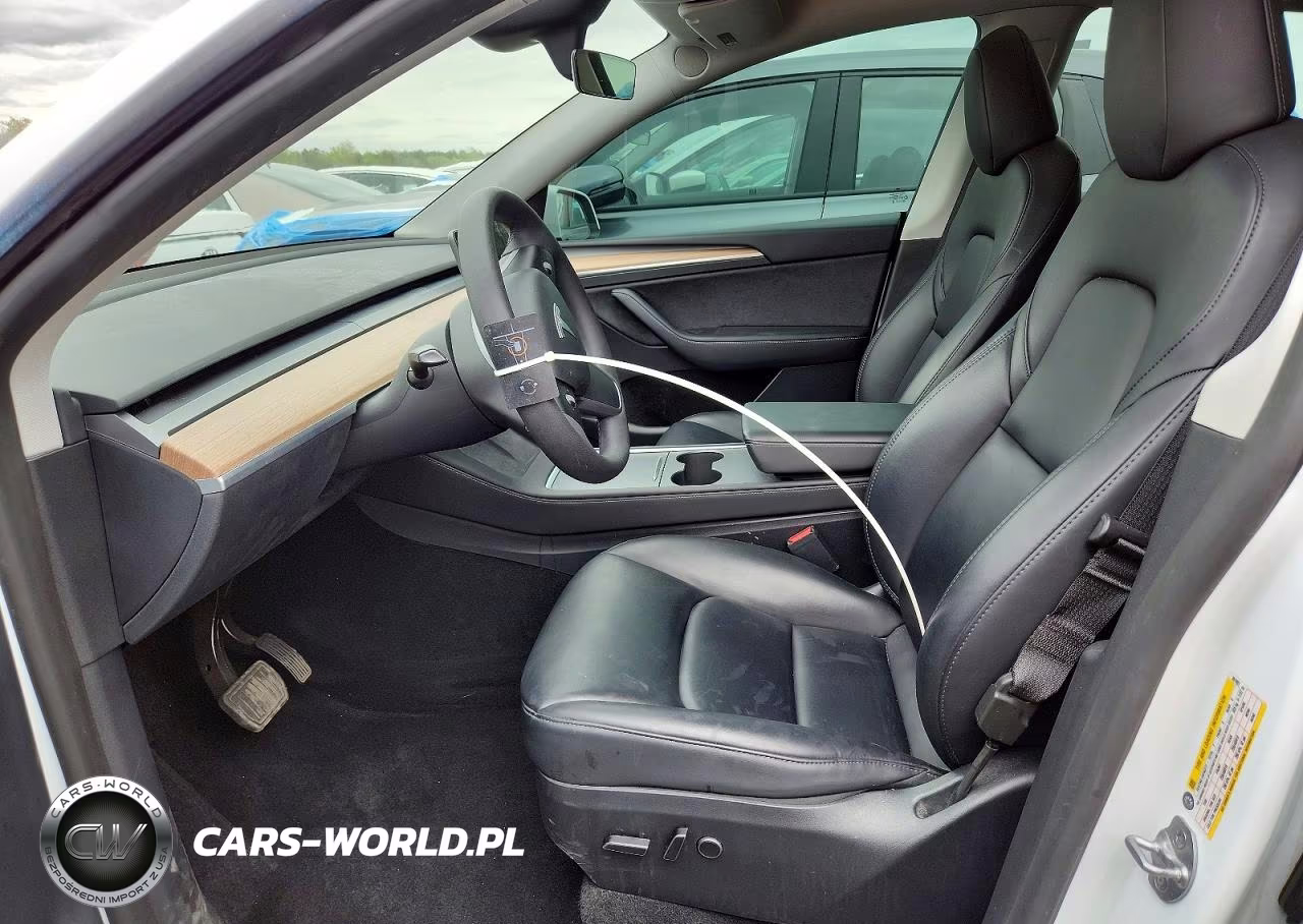 2023 Tesla Model Y VIN:7SAYGAEE8PF881991 - 7