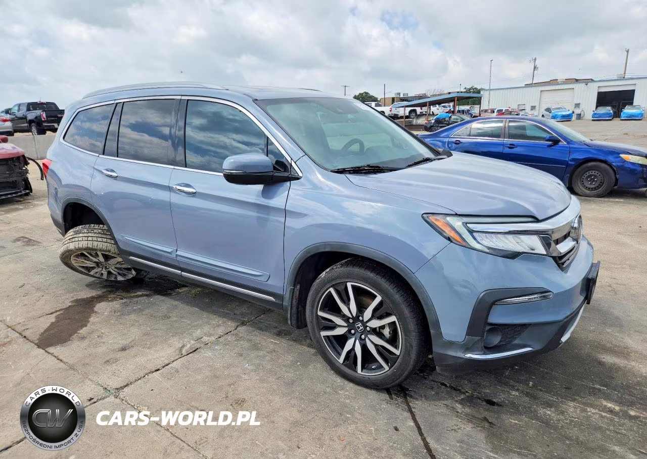 2022 Honda Pilot Touring VIN:5FNYF5H66NB023878 - 4