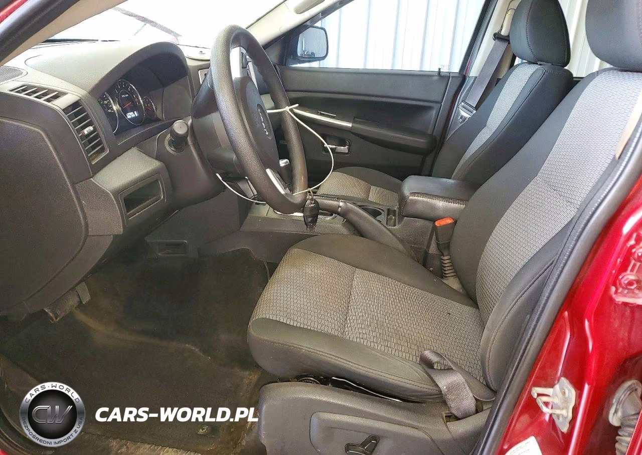 2009 Jeep Grand Cherokee Laredo VIN:1J8GR48K39C543087 - 7