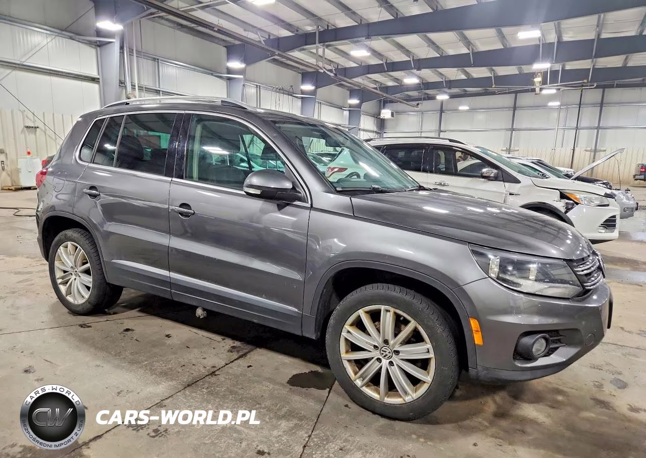 2014 Volkswagen Tiguan S VIN:WVGBV3AX8EW625883 - 4