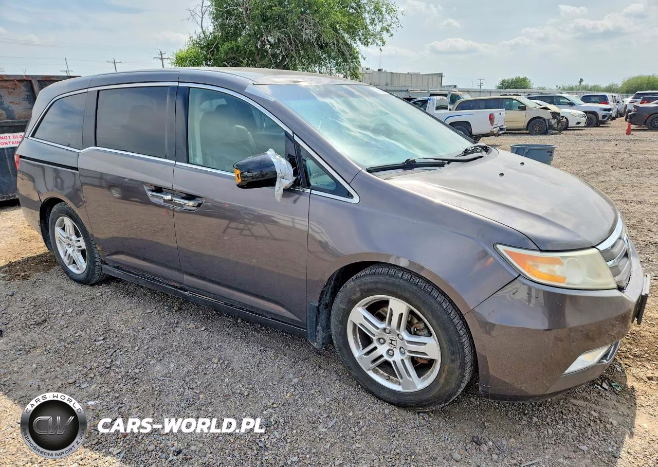 2012 Honda Odyssey Touring VIN:5FNRL5H9XCB058475 - 4