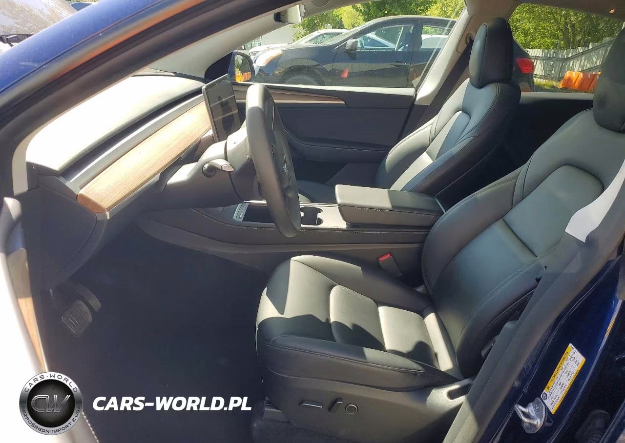 2023 Tesla Model Y VIN:7SAYGDEE8PA123454 - 7