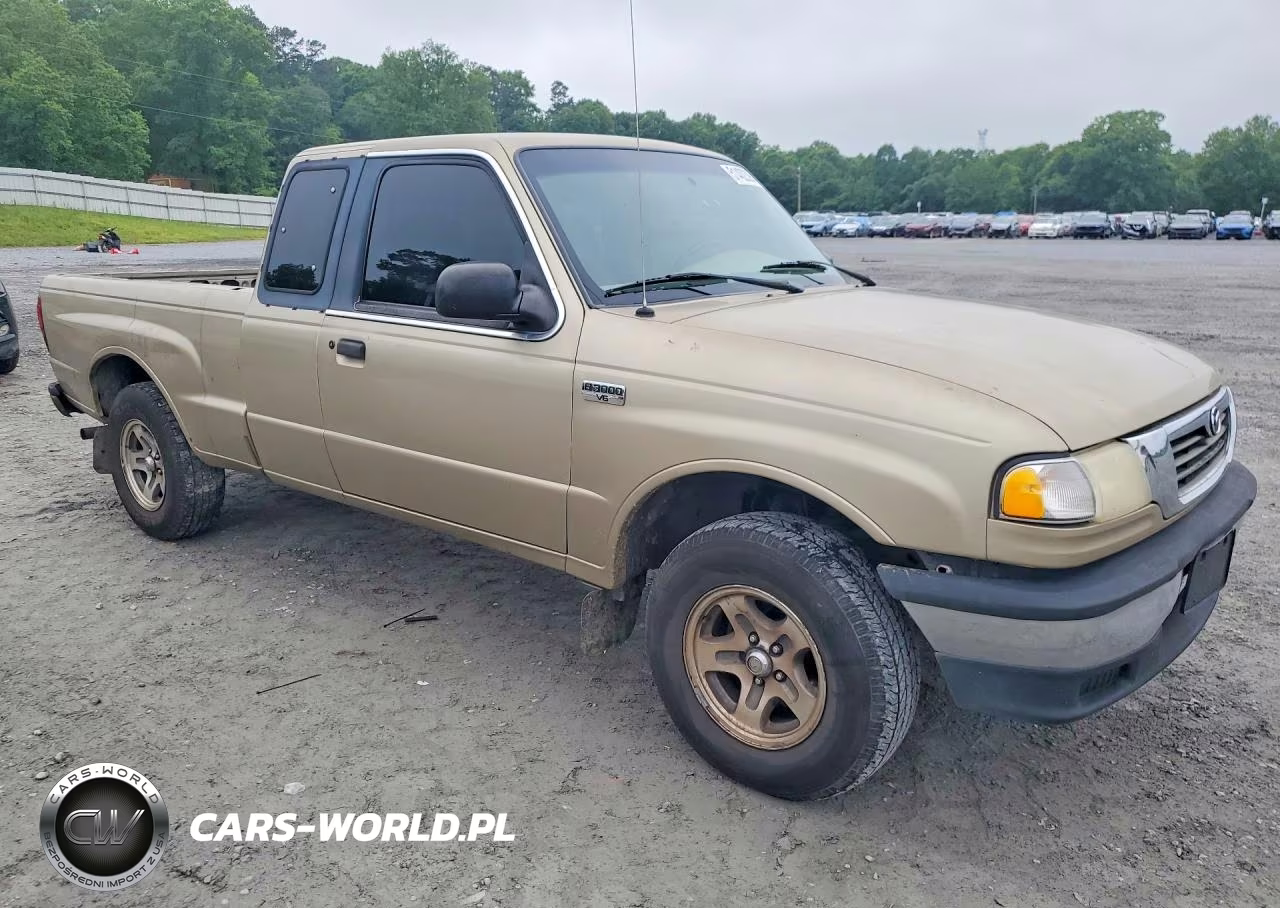 1999 Mazda B3000 Cab Plus VIN:4F4YR16V7XTM13874 - 4