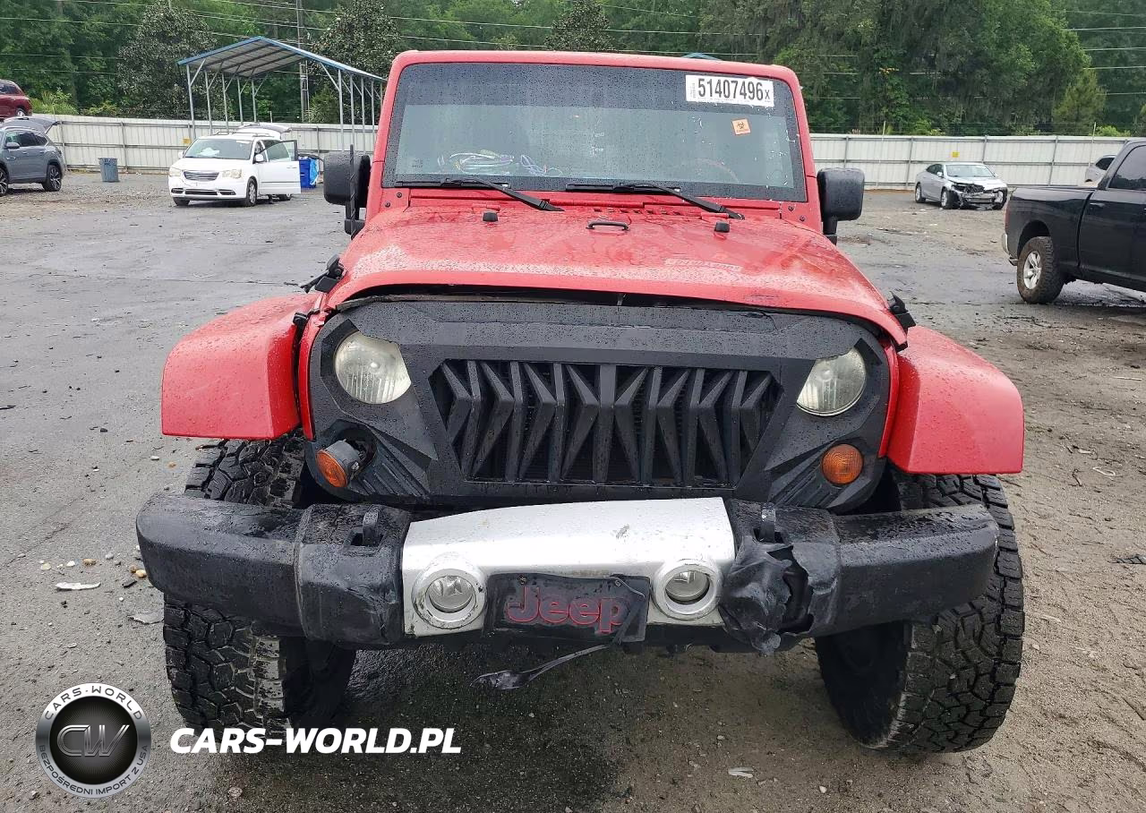 2012 Jeep Wrangler Unlimited Sahara VIN:1C4BJWEG1CL130628 - 5