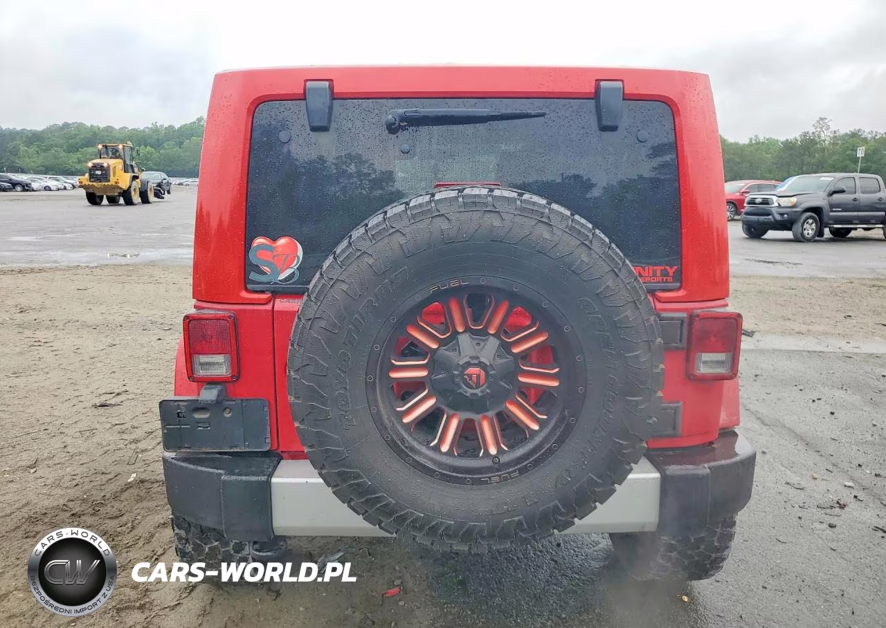 2012 Jeep Wrangler Unlimited Sahara VIN:1C4BJWEG1CL130628 - 6