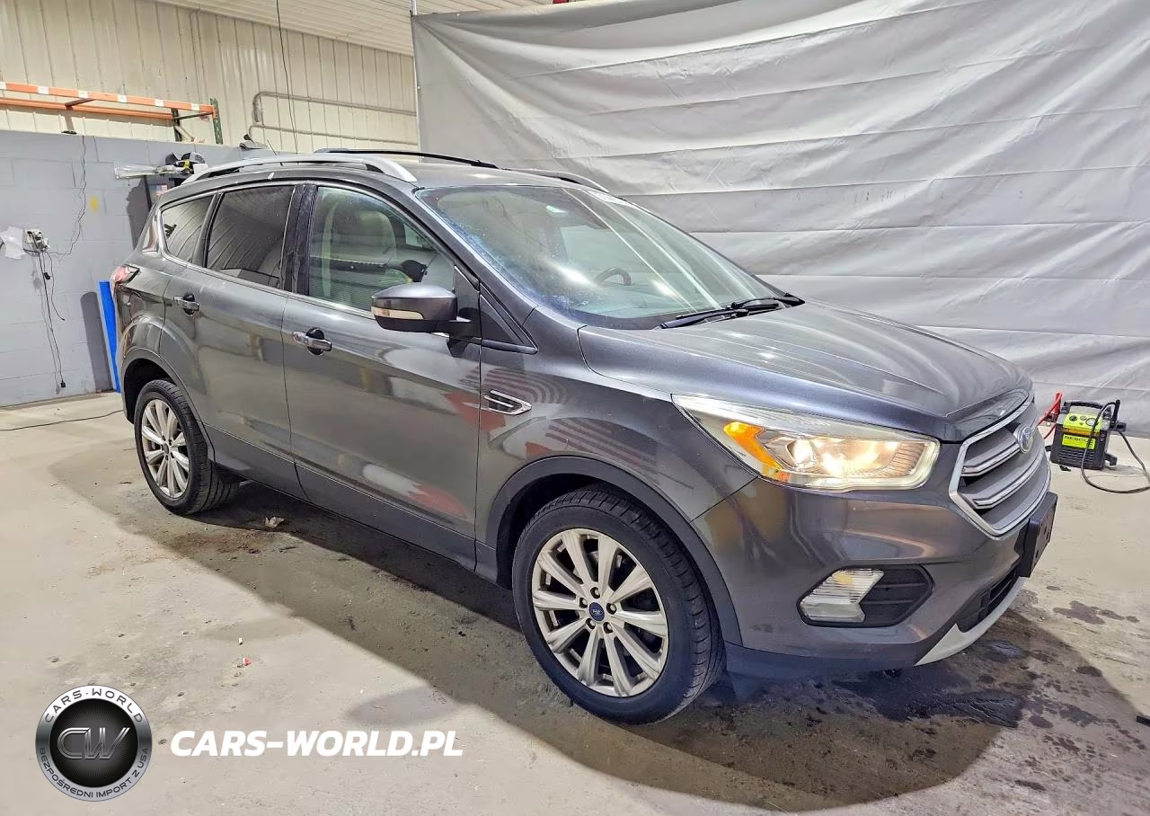 2017 Ford Escape Titanium VIN:1FMCU9J98HUC13023 - 4