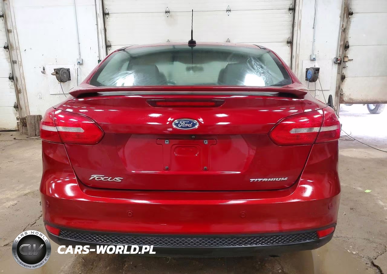 2017 Ford Focus Titanium VIN:1FADP3J21HL313329 - 6