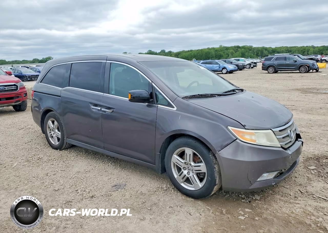2011 Honda Odyssey Touring VIN:5FNRL5H90BB060461 - 4