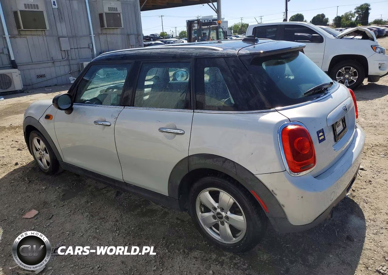2015 Mini Cooper VIN:WMWXS5C57FT828743 - 2