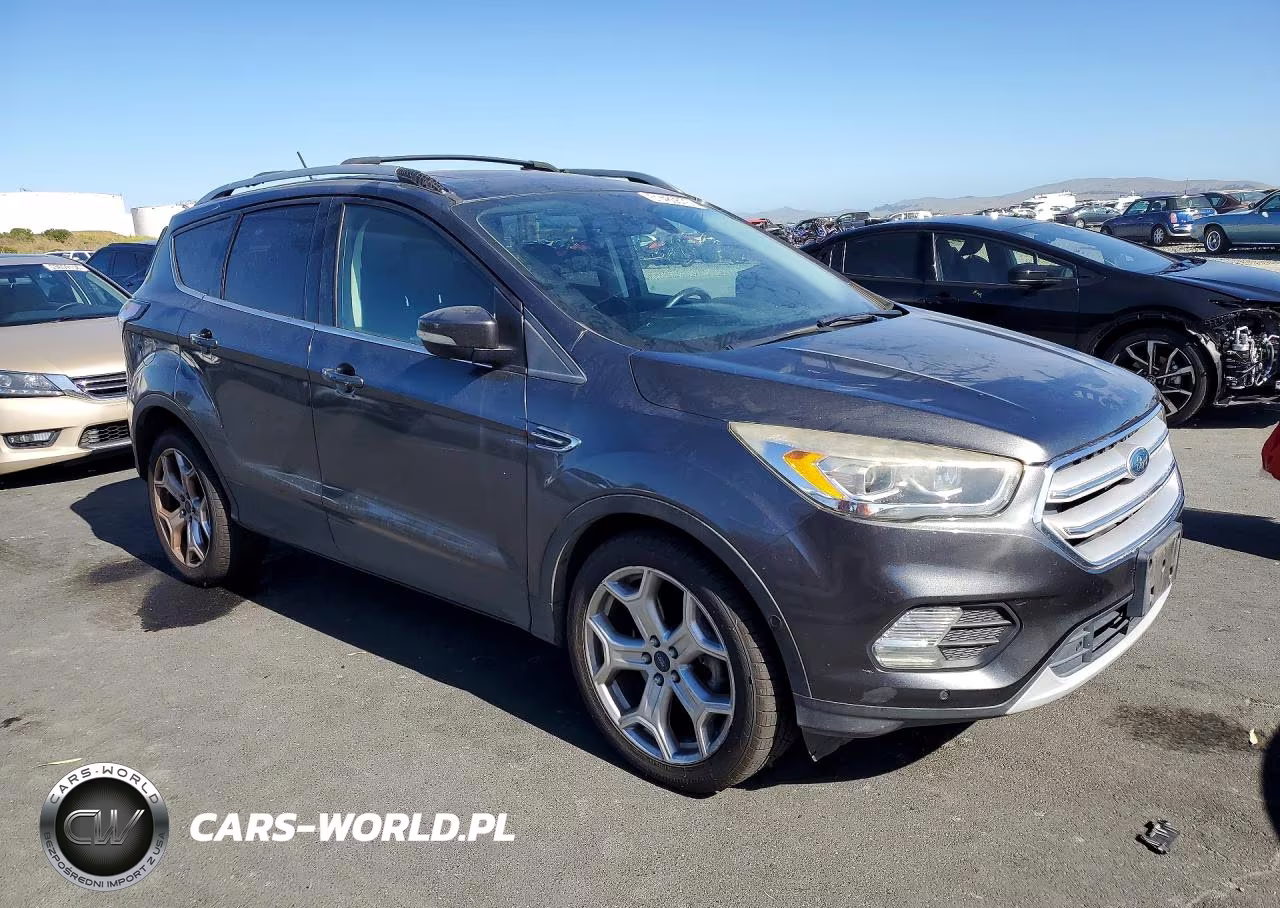 2018 Ford Escape Titanium VIN:1FMCU0J93JUA24099 - 4