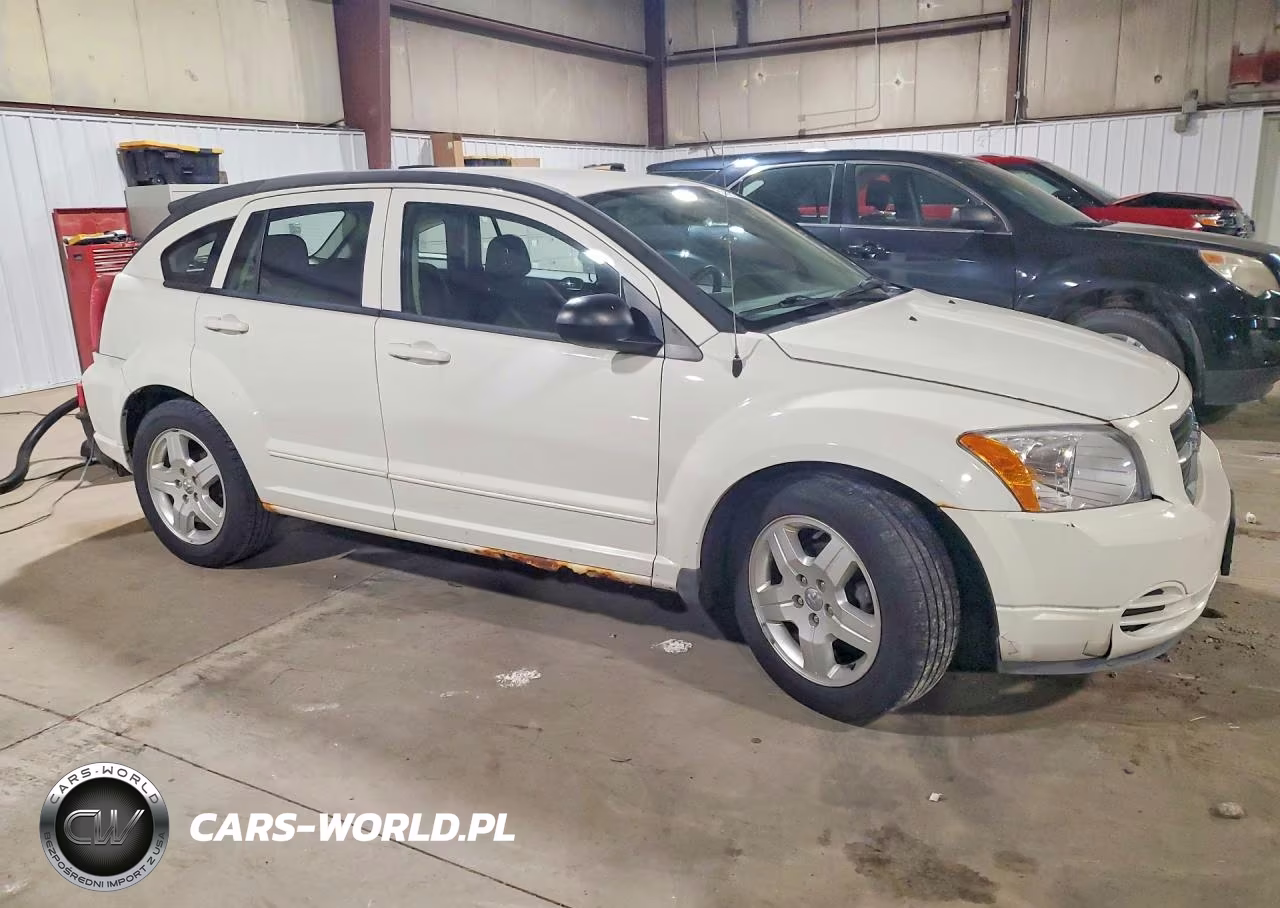 2009 Dodg Caliber VIN:1B3HB48A09D147850 - 4