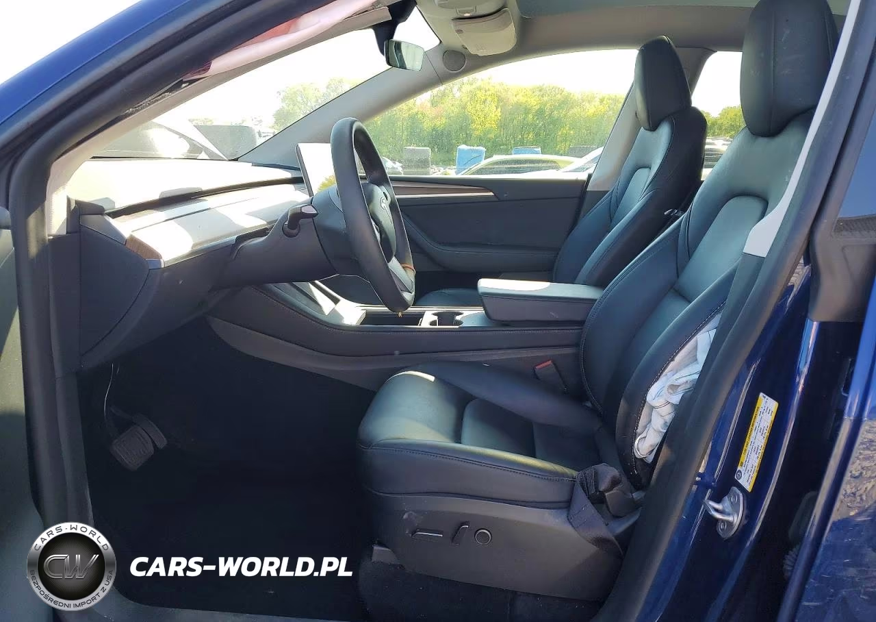 2023 Tesla Model Y VIN:7SAYGAEE0PF774434 - 7