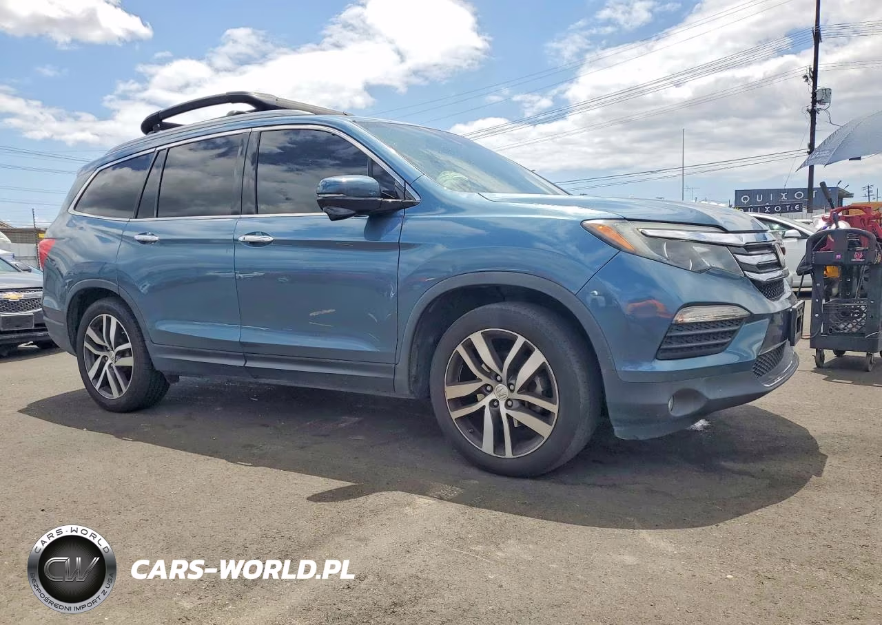 2018 Honda Pilot Touring VIN:5FNYF5H93JB029786 - 4