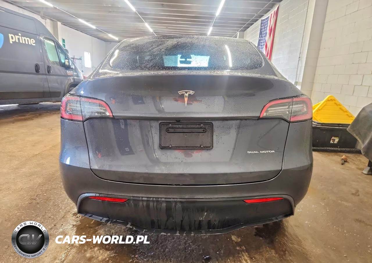 2023 Tesla Model Y VIN:7SAYGDEE2PF610247 - 6