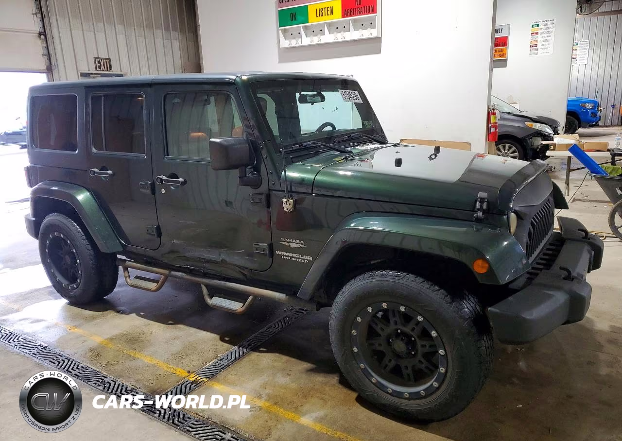 2011 Jeep Wrangler Unlimited Sahara VIN:1J4BA5H19BL512299 - 4
