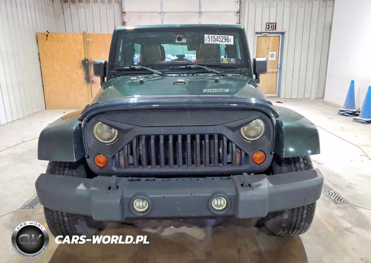 2011 Jeep Wrangler Unlimited Sahara VIN:1J4BA5H19BL512299 - 5