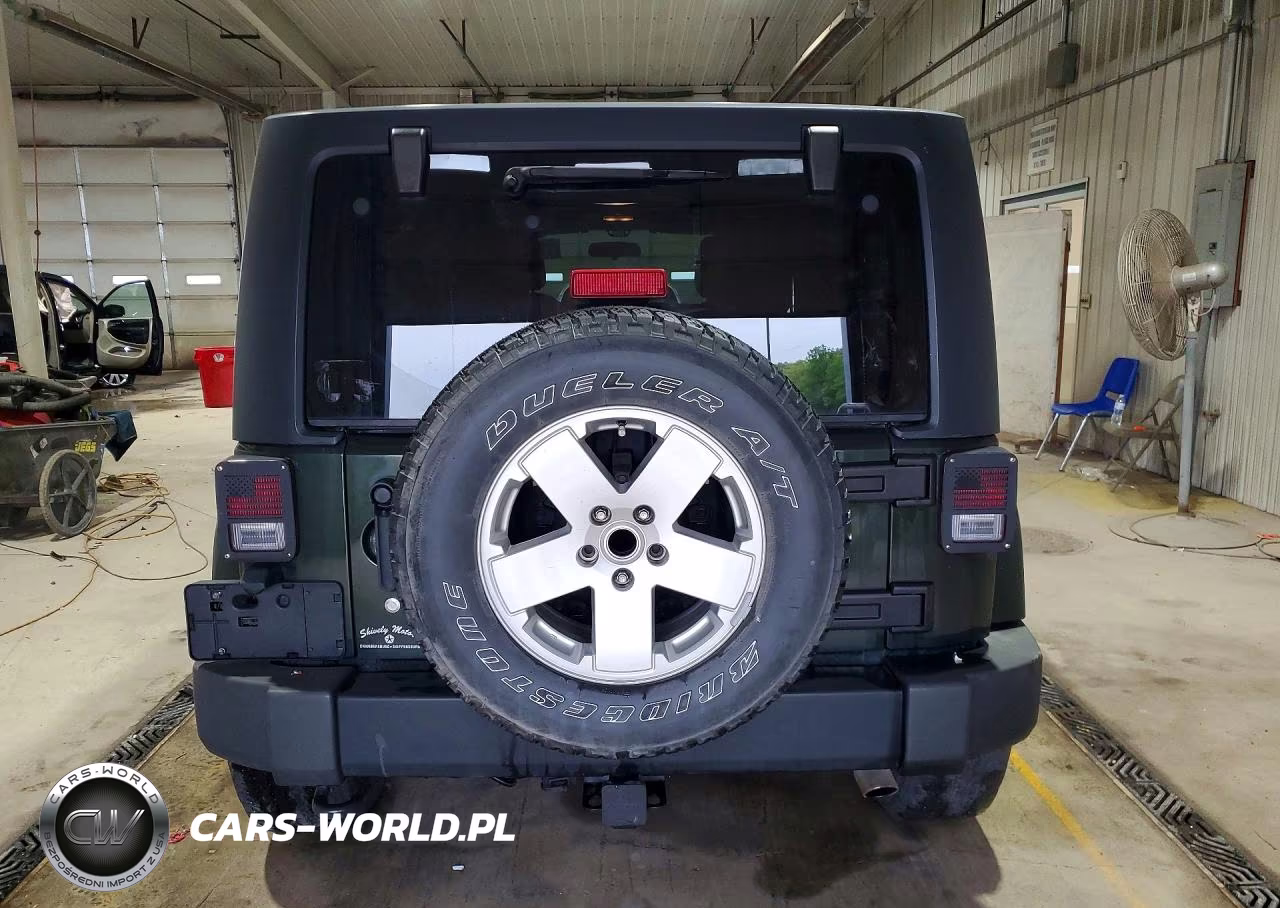 2011 Jeep Wrangler Unlimited Sahara VIN:1J4BA5H19BL512299 - 6