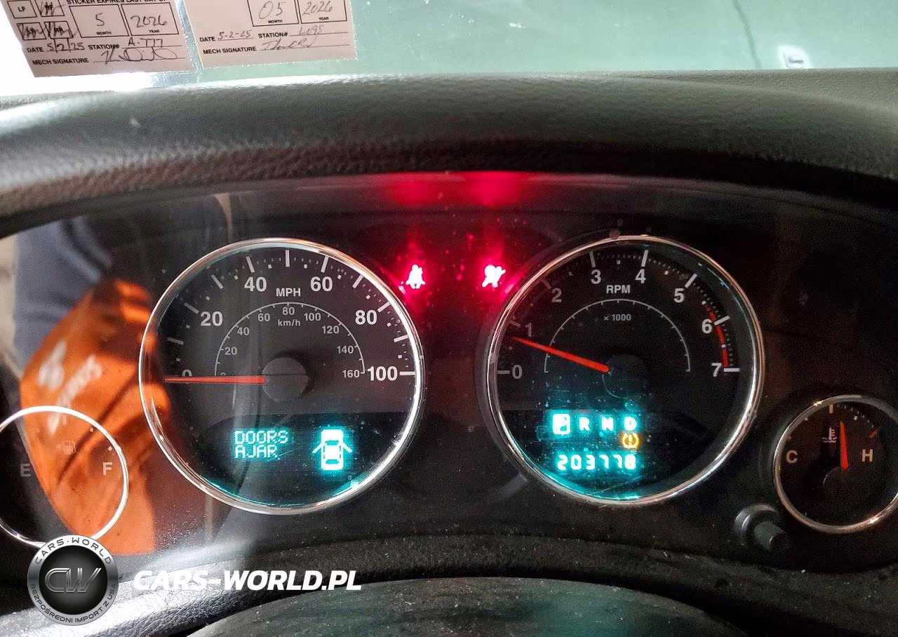 2011 Jeep Wrangler Unlimited Sahara VIN:1J4BA5H19BL512299 - 9