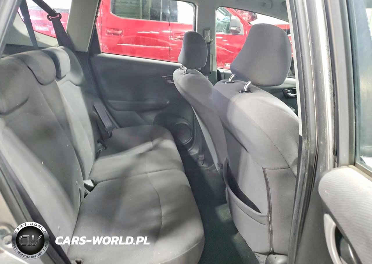 2009 Honda Fit VIN:JHMGE88249S008865 - 10