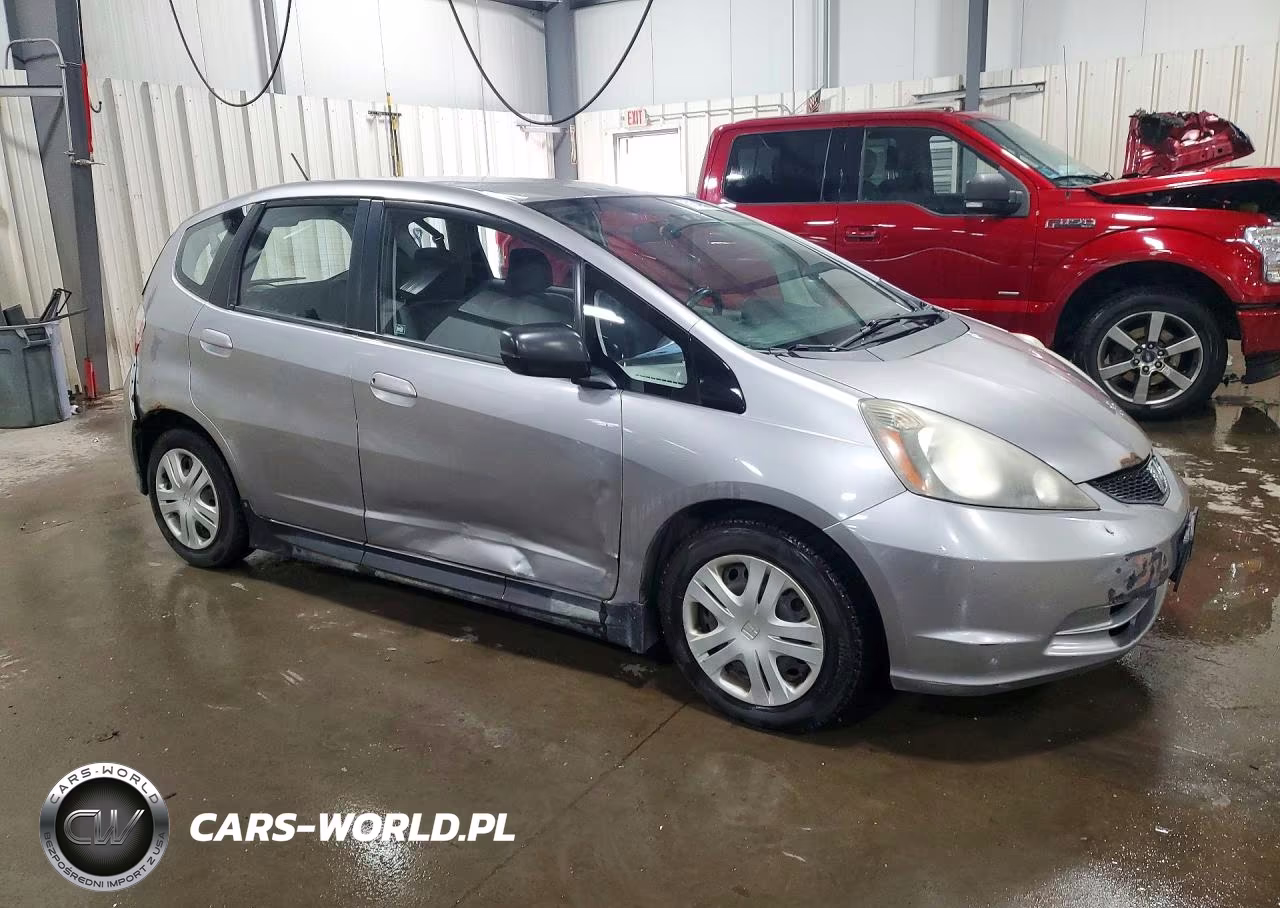 2009 Honda Fit VIN:JHMGE88249S008865 - 4