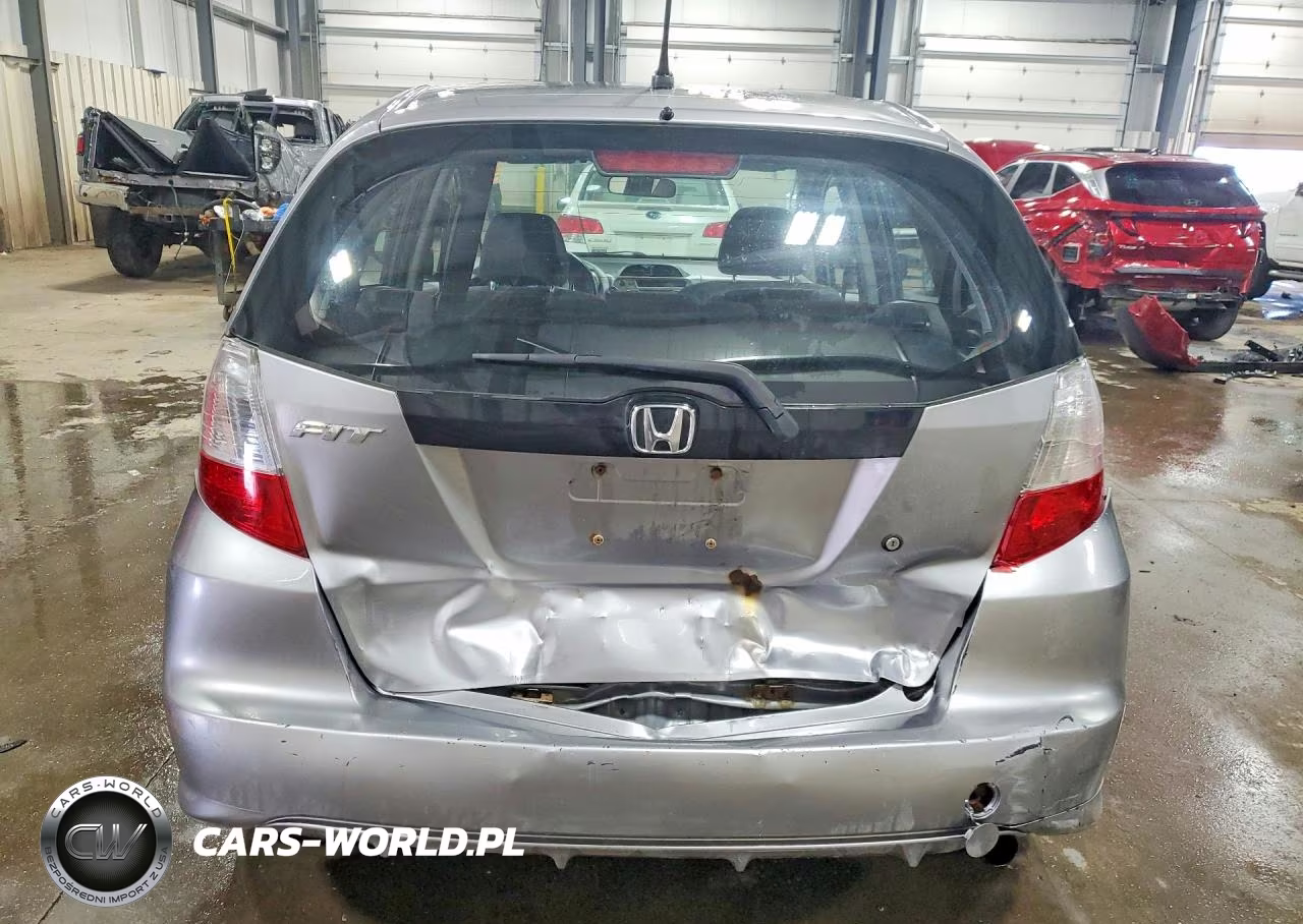 2009 Honda Fit VIN:JHMGE88249S008865 - 6