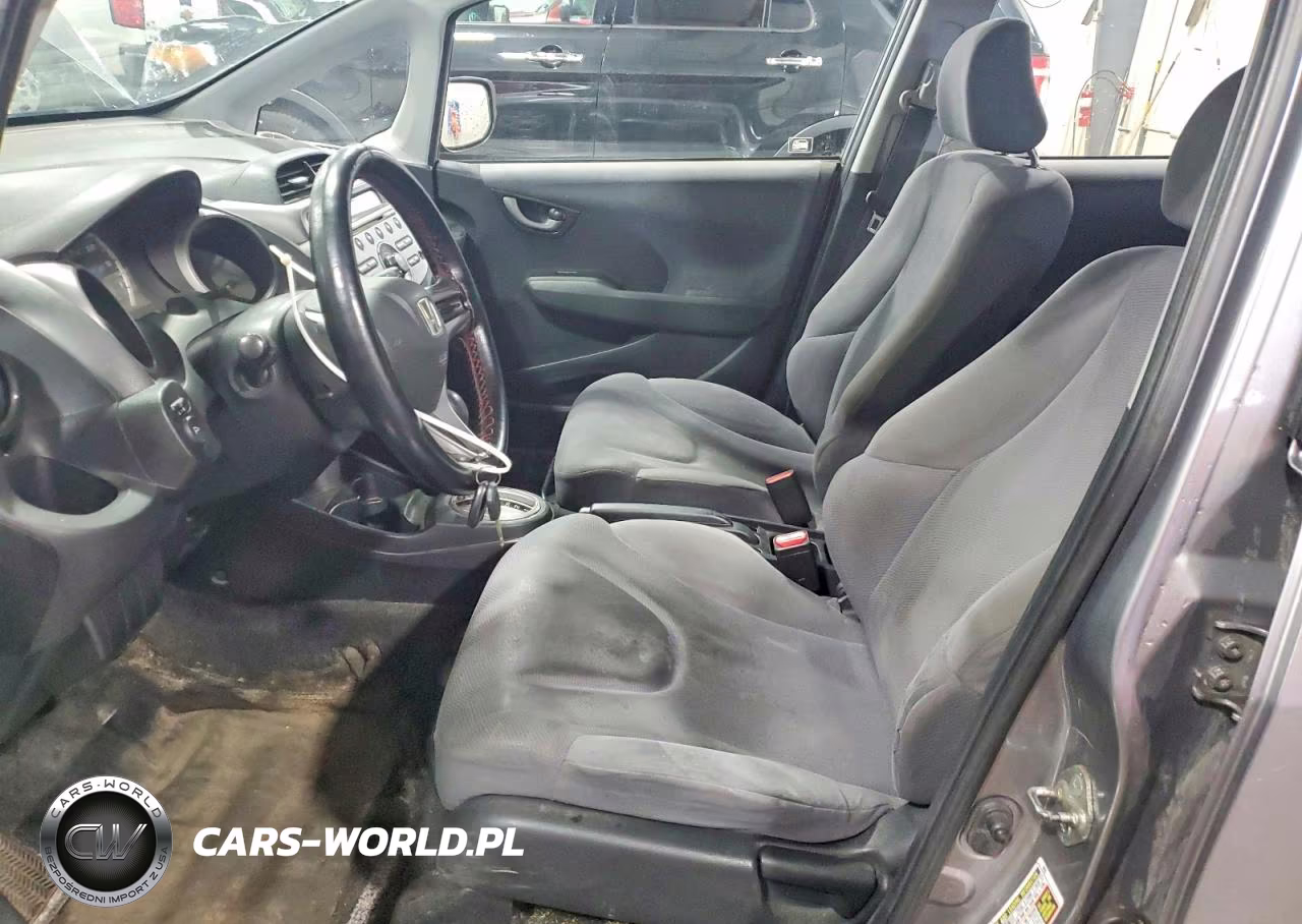 2009 Honda Fit VIN:JHMGE88249S008865 - 7
