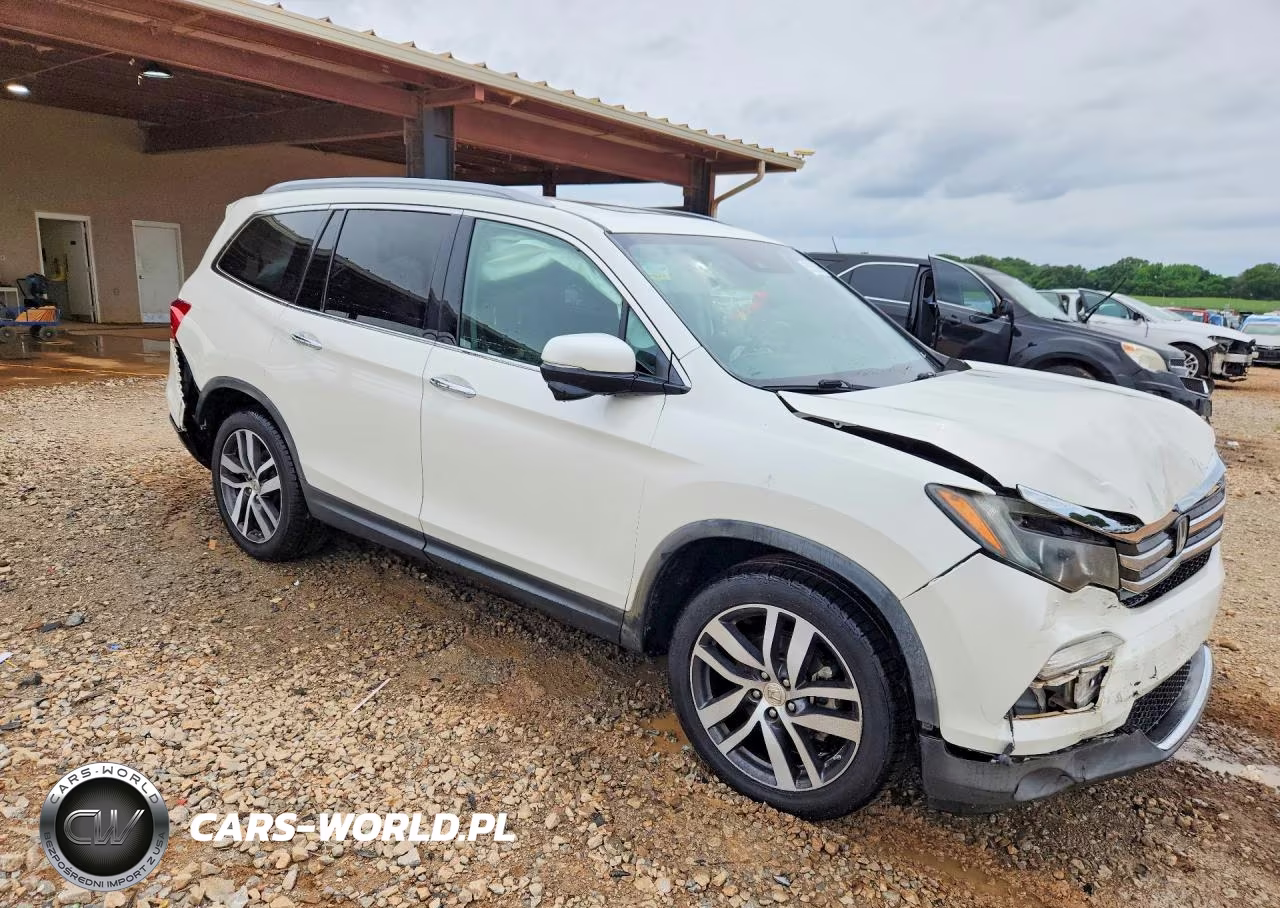 2018 Honda Pilot Touring VIN:5FNYF5H99JB013558 - 4
