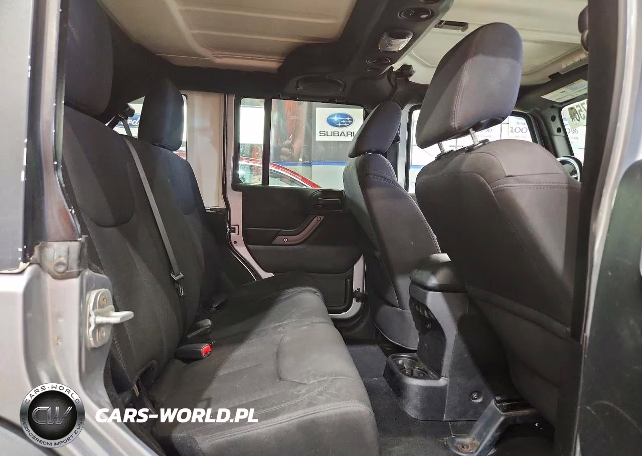 2013 Jeep Wrangler Unlimited Sport VIN:1C4BJWDGXDL699433 - 11