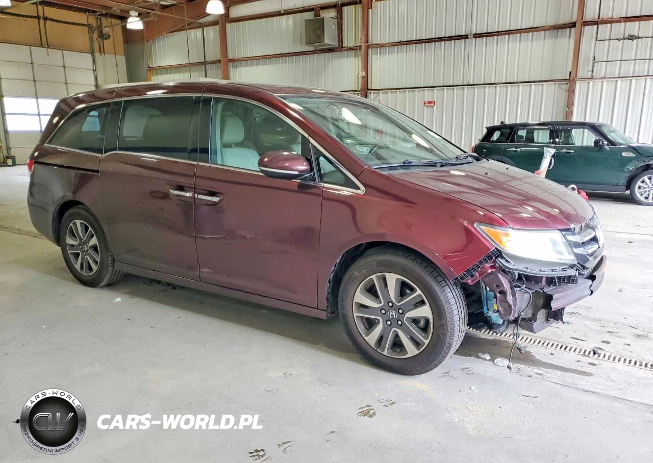 2015 Honda Odyssey Touring VIN:5FNRL5H90FB102276 - 4