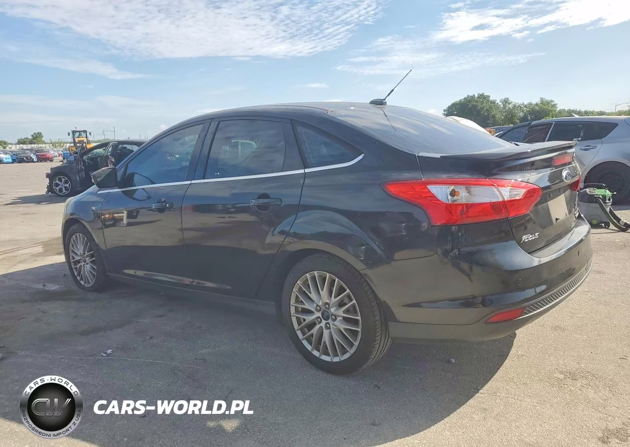 2013 Ford Focus Titanium VIN:1FADP3J21DL300073 - 2