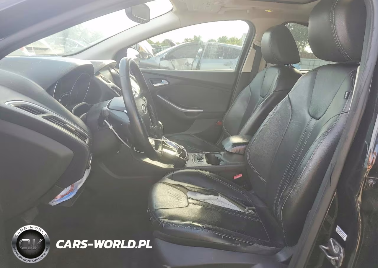 2013 Ford Focus Titanium VIN:1FADP3J21DL300073 - 7