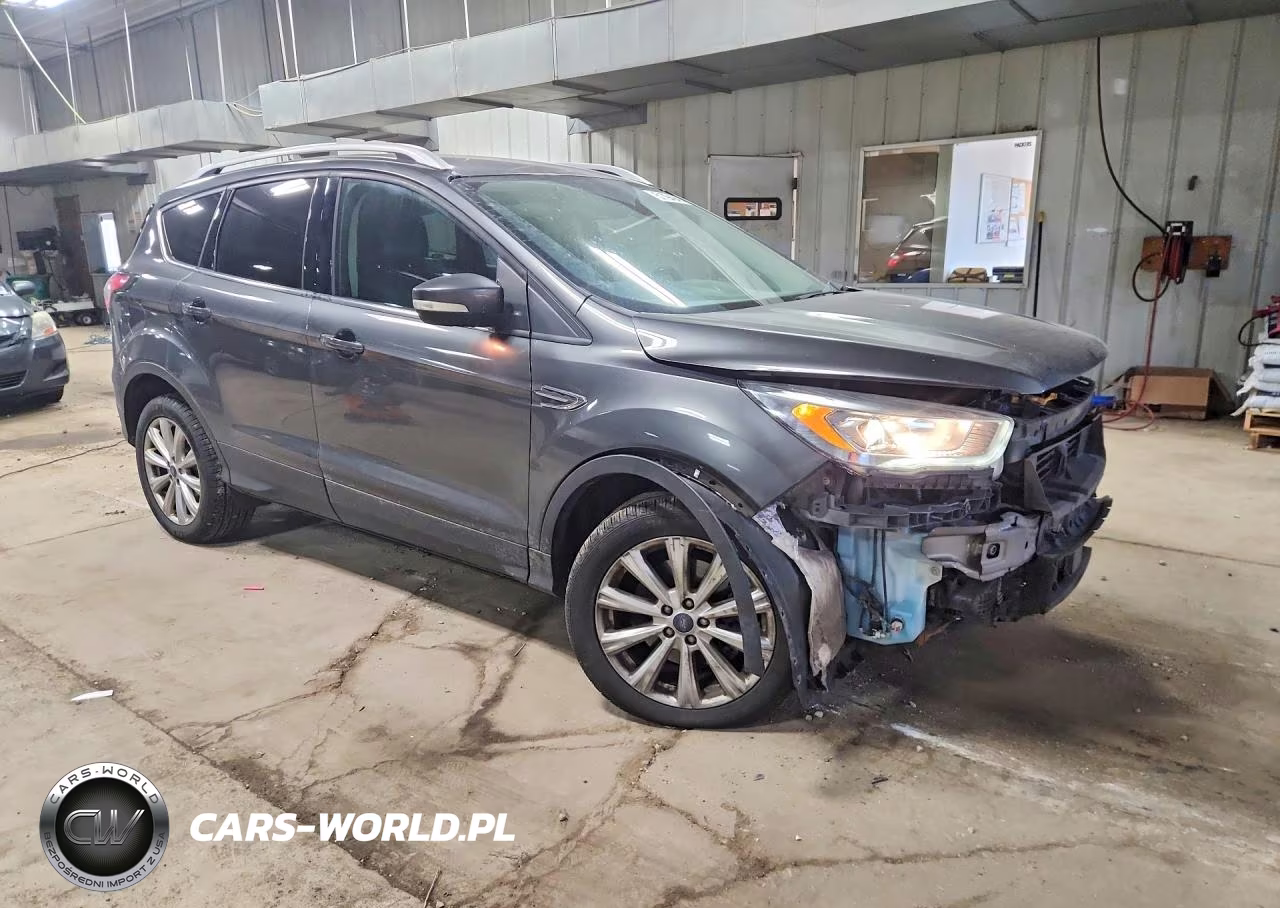 2017 Ford Escape Titanium VIN:1FMCU9J98HUA27482 - 4