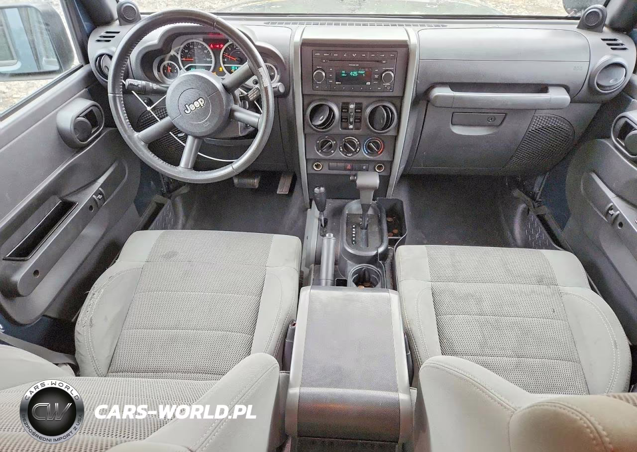 2007 Jeep Wrangler Sahara VIN:1J4GA59107L156773 - 8