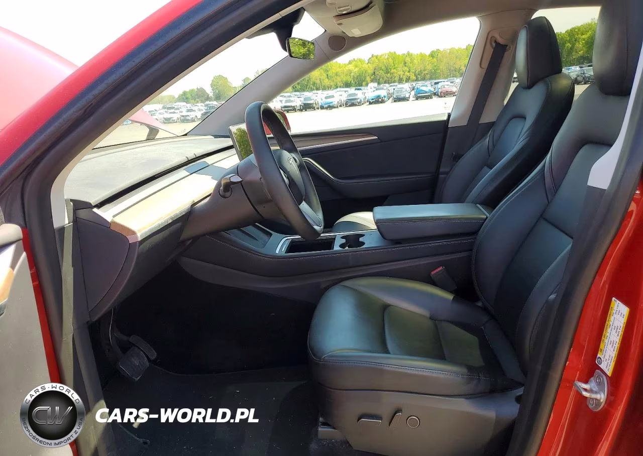 2023 Tesla Model Y VIN:7SAYGDEEXPA106557 - 7